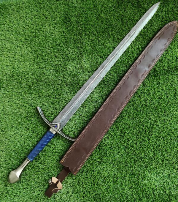 Elegant Damascus steel sword with blue leather-wrapped handle and handcrafted brown leather sheath
